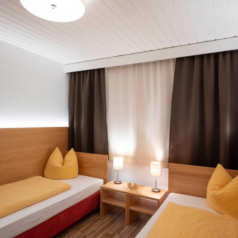 Haus Leithner - Suiten & Apartments - Familiensuite mit 2 Schlafzimmern - 11