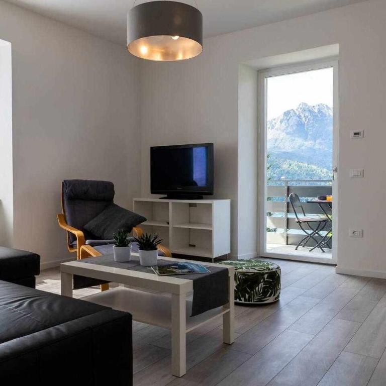 Numero 53 Tenna OSPITAR - Apartamento con vistas al lago - 2