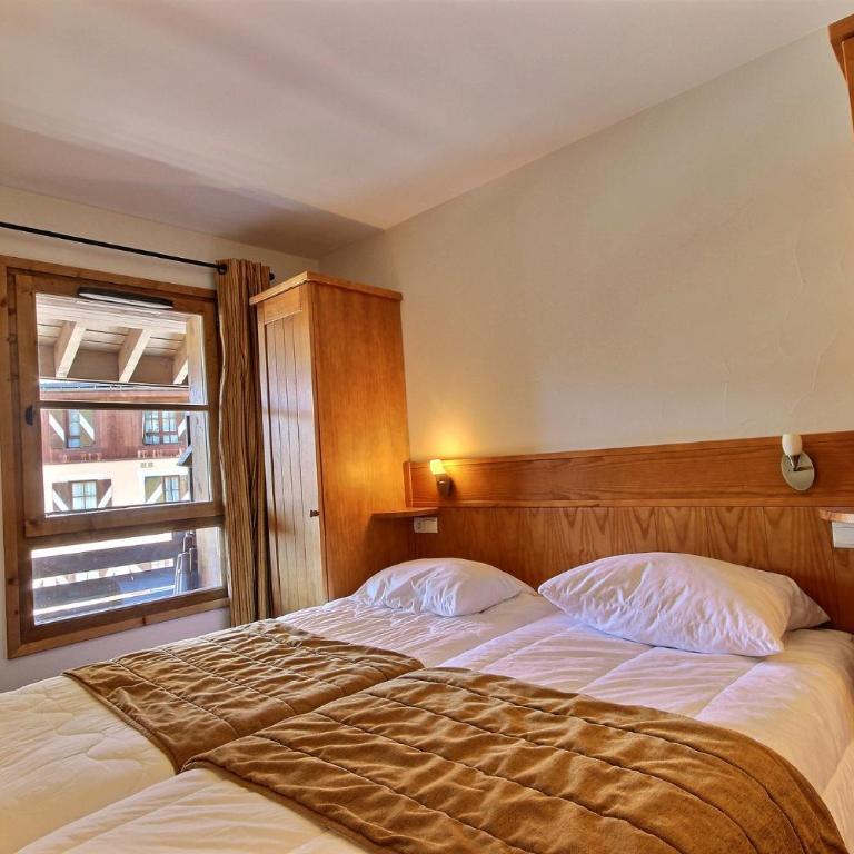 Auberge jérôme 614 - Arc 1950 - Duplex prestige 4 rooms 3 bedrooms for 6-8 people 5-star residence Auberge Jérôme - village heart - Three-Bedroom Apartment - 4