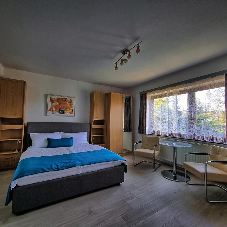 Gästehaus auf der Höhe - Apartment mit Gartenblick - 7