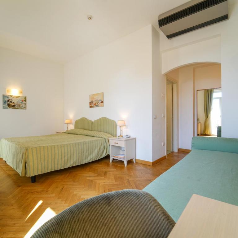 HG Hotel Cappelli - Camera Tripla - 5