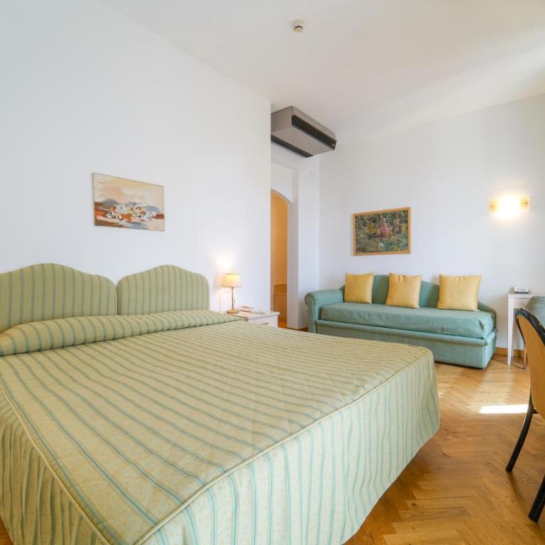 HG Hotel Cappelli - Camera Tripla - 6
