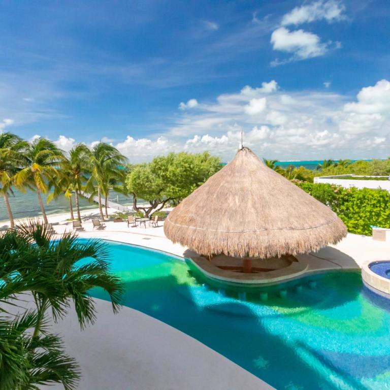 Sunset Condo 104 Puerta al Mar Isla Mujeres Mexico - Three-Bedroom Apartment - 1