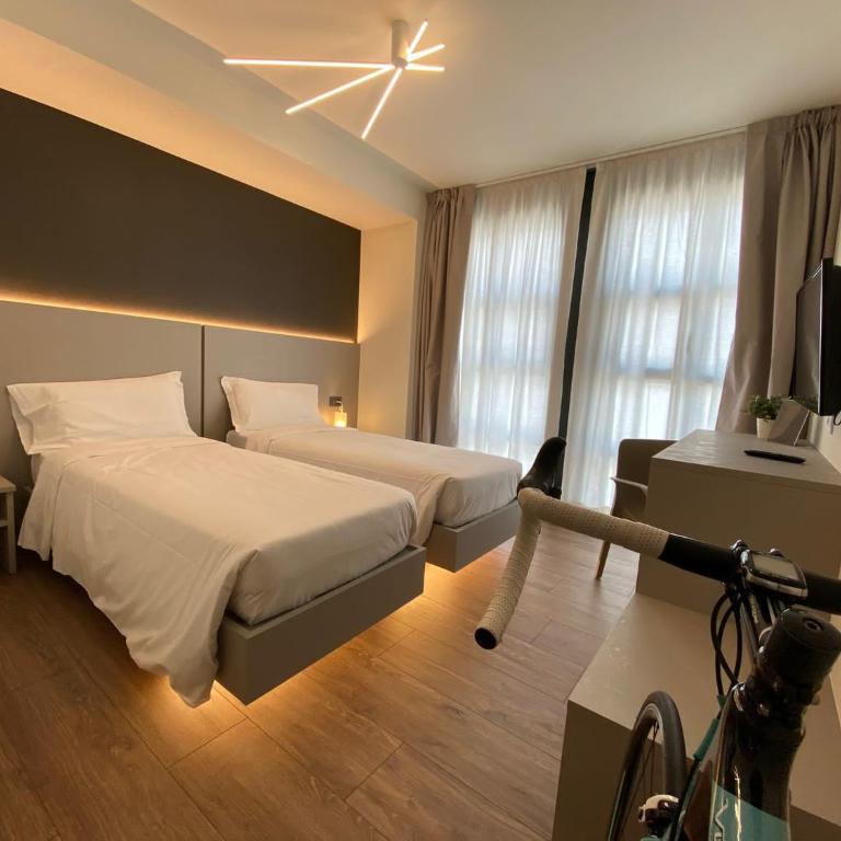 Fly Bike Hotel - Camera Doppia con Letti Singoli - 1