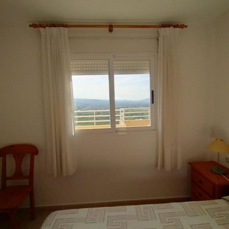 PRECIOSO ÁTICO CON AIRE ACONDICIONADO y PISCINA - Apartamento de 2 dormitorios - 12