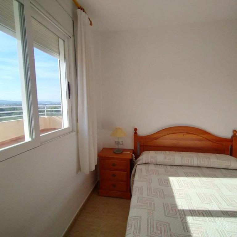 PRECIOSO ÁTICO CON AIRE ACONDICIONADO y PISCINA - Apartamento de 2 dormitorios - 13