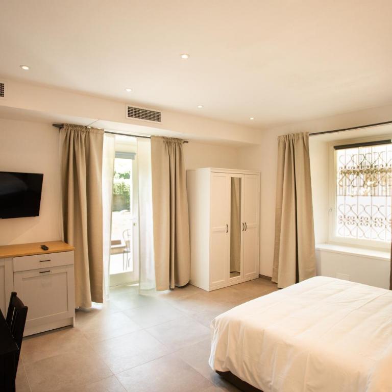 ALPENCITY SUITES - Camera Matrimoniale con Vista Giardino - 1