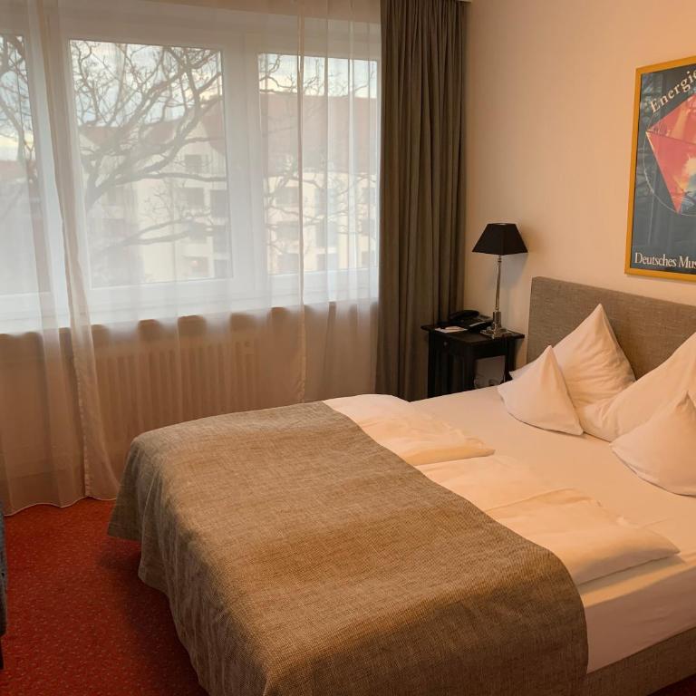 Hotel Nymphenburg City - München - Doppelzimmer - 17
