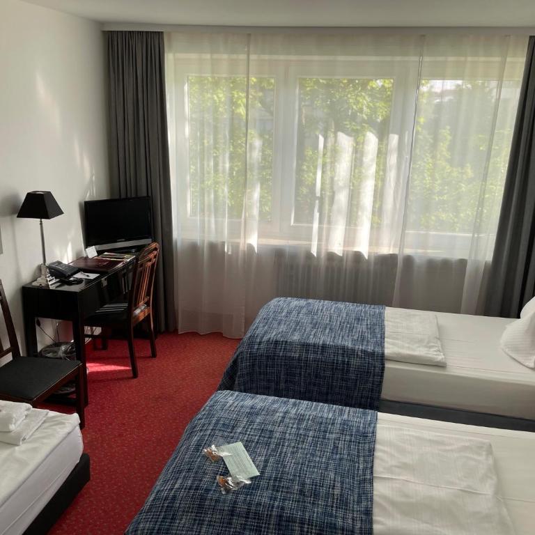 Hotel Nymphenburg City - München - Doppelzimmer - 18