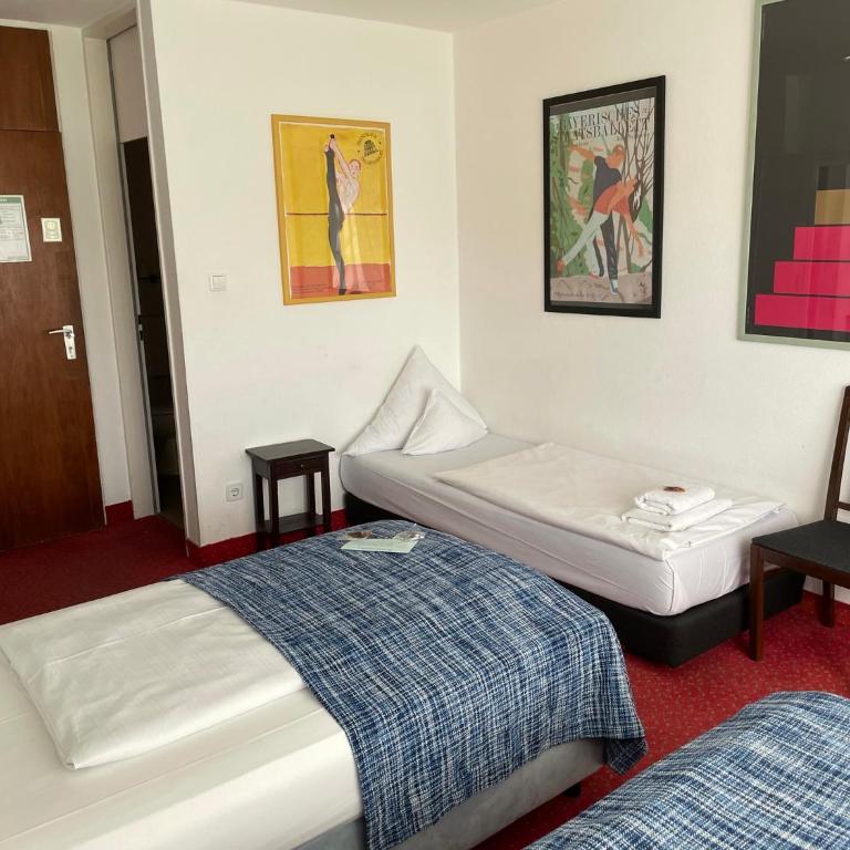 Hotel Nymphenburg City - München - Dreibettzimmer - 18