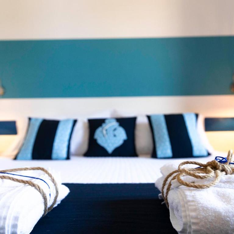 Villa Curiazzi Guesthouse Viale la Pelosa 16 - Camera Matrimoniale Deluxe con 1 Letto Supplementare - 5