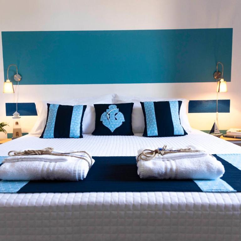 Villa Curiazzi Guesthouse Viale la Pelosa 16 - Camera Matrimoniale Deluxe con 1 Letto Supplementare - 12