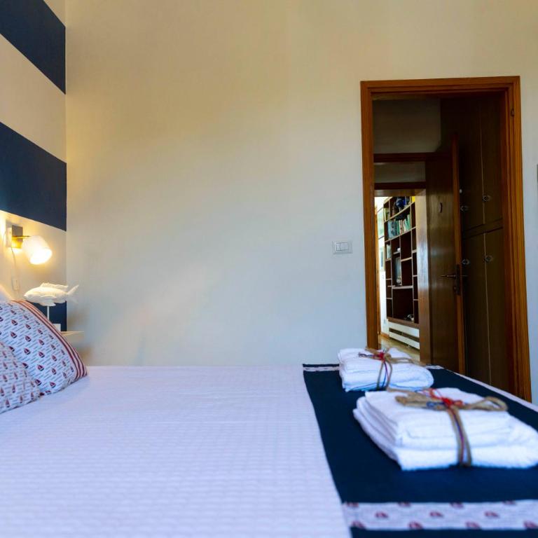 Villa Curiazzi Guesthouse Viale la Pelosa 16 - Camera Matrimoniale Deluxe con 1 Letto Supplementare - 5