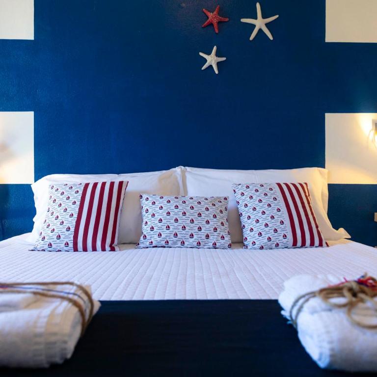 Villa Curiazzi Guesthouse Viale la Pelosa 16 - Camera Matrimoniale Deluxe con 1 Letto Supplementare - 8