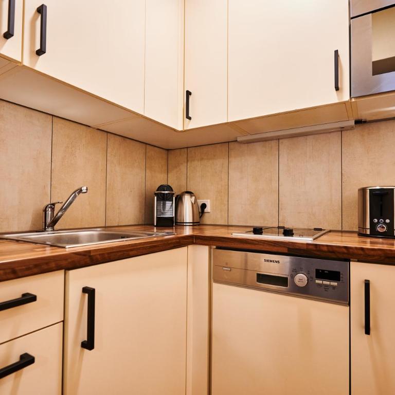 EVI APARTMENTS via we rent - Apartment mit 1 Schlafzimmer und Balkon - 8