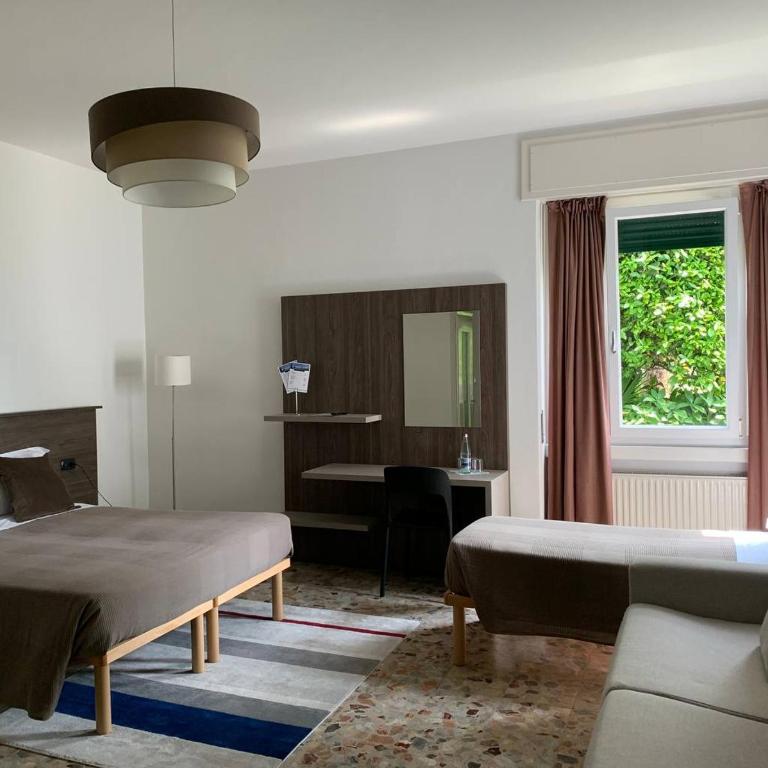 Hotel Loveno - Dreibettzimmer mit Gartenblick - 1