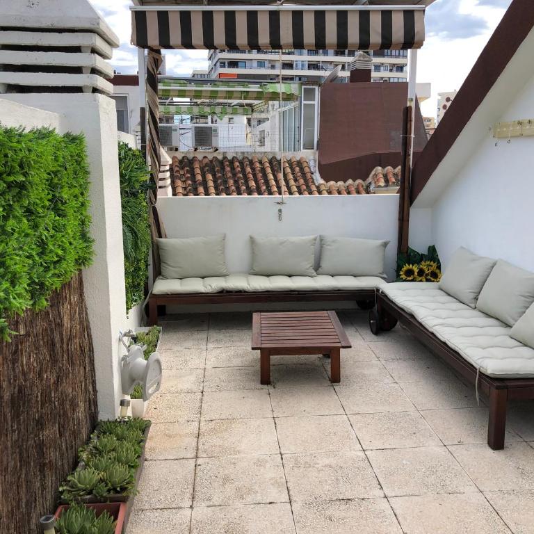 El Cortijuelo. Magnificent triplex terraced house with rooftop of 18m2, overlooking the sea. Parking - Vacation Home - 3