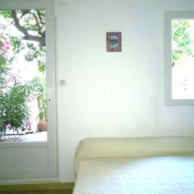 Logement climatisé avec jardin et parking pour 2 personnes en bord de plage - One-Bedroom Apartment - 3