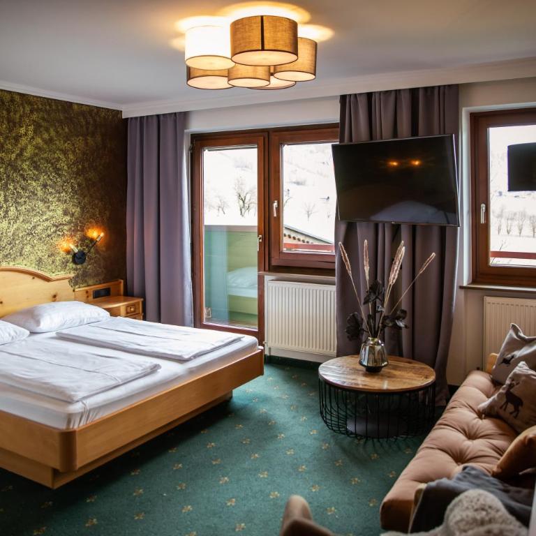 Hotel Restaurant tauernhex - Dreibettzimmer mit Bergblick - 3
