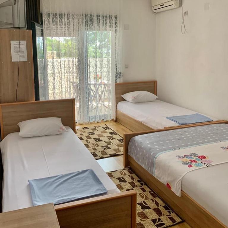 Beqa Apartments - Četvorokrevetna Soba sa Pogledom na More - 5
