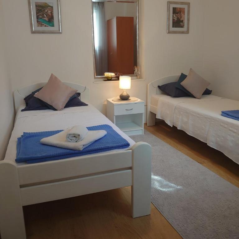 Apartments Tulipan - with free private parking garage - Two-Bedroom Apartment with Terrace - 22