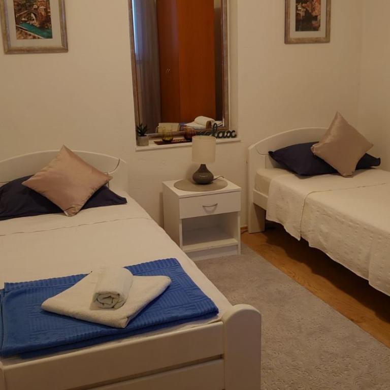 Apartments Tulipan - with free private parking garage - Two-Bedroom Apartment with Terrace - 21