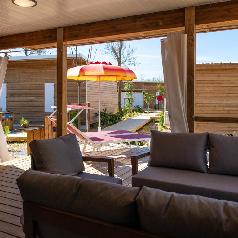 VILLAGE CLUB LES SABLONS - Bungalow Deluxe - 14