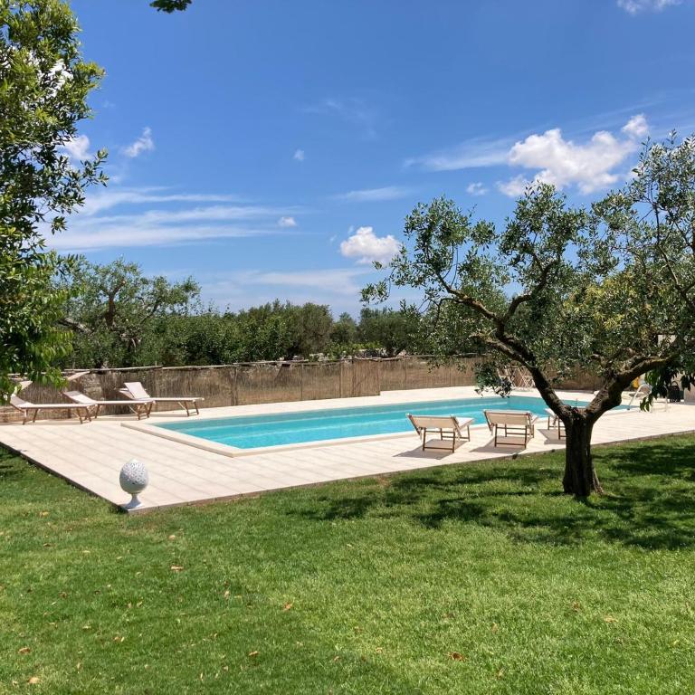 Marinella Suite Home - Camera Quadrupla con Vista Giardino - 17