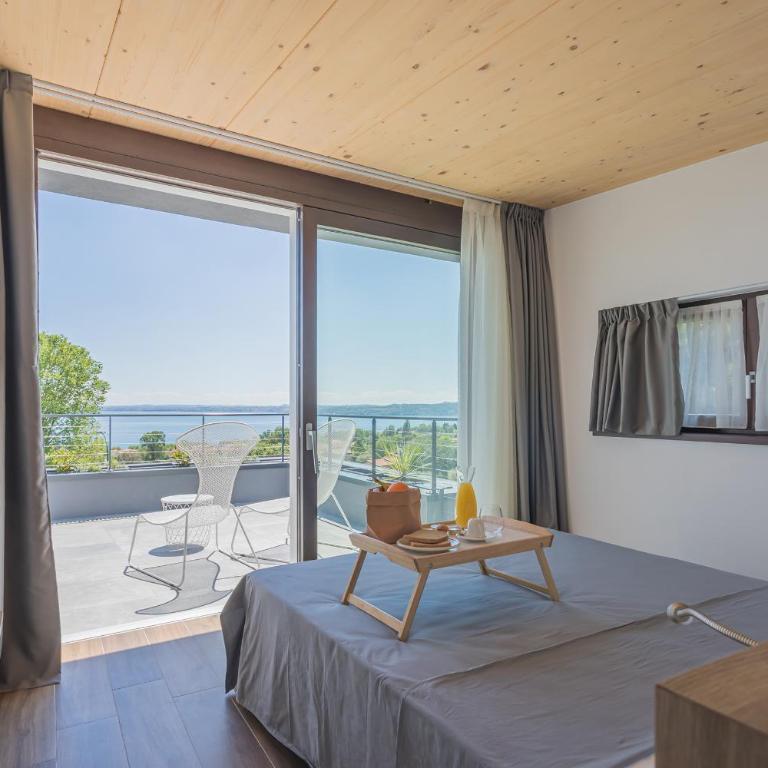 INSULA FELIX Bed&Breakfast - Deluxe Doppelzimmer mit Terrasse und Seeblick - 2