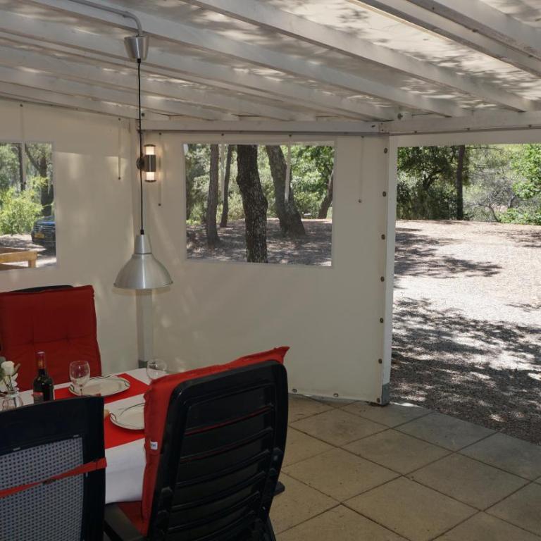 Chalets with kitchen outside at Camping Leï Suves - JoyCasa - Mobile Home - 3