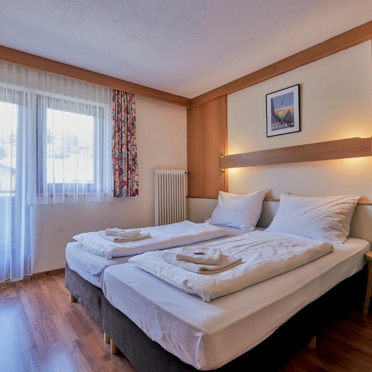 Pension Sonnwend - inklusive Gästekarte - Doppel-/Zweibettzimmer mit Balkon - 2