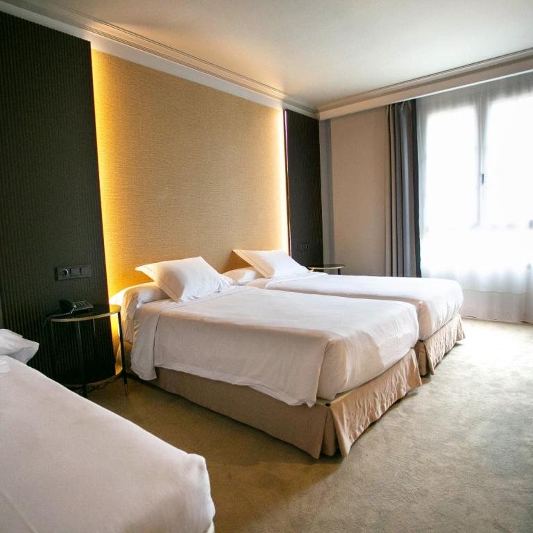 Hotel Sercotel Ciudad de Oviedo - Habitación Doble con cama supletoria - 1 o 2 camas - 2