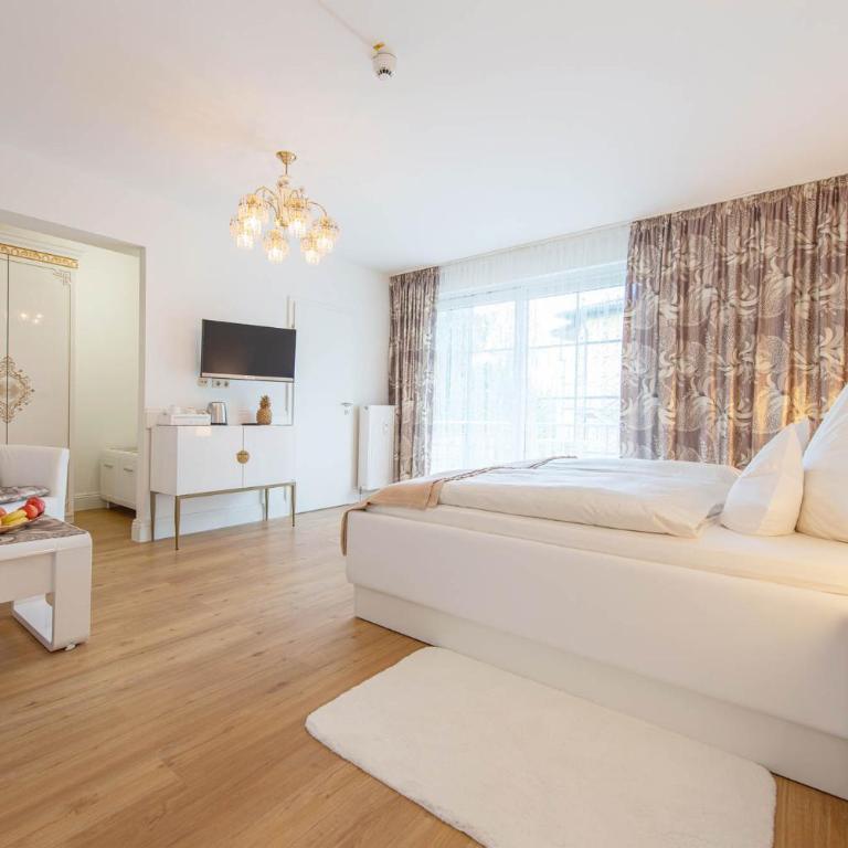 Hotel Garni Lichtquelle - Deluxe Doppelzimmer mit Balkon - 6