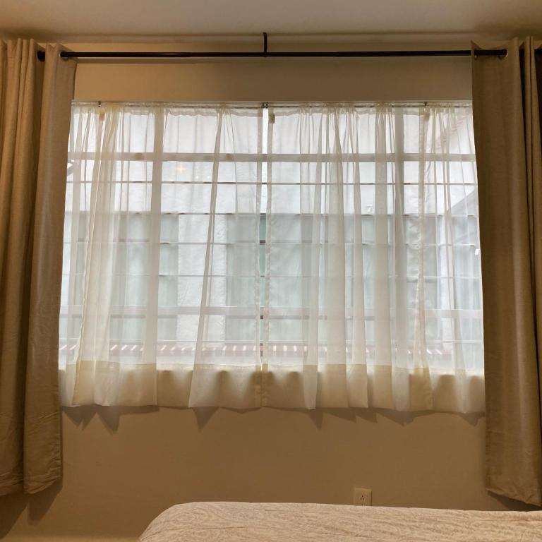 Nebraska Suites WTC - Double Room with Private Bathroom - 1