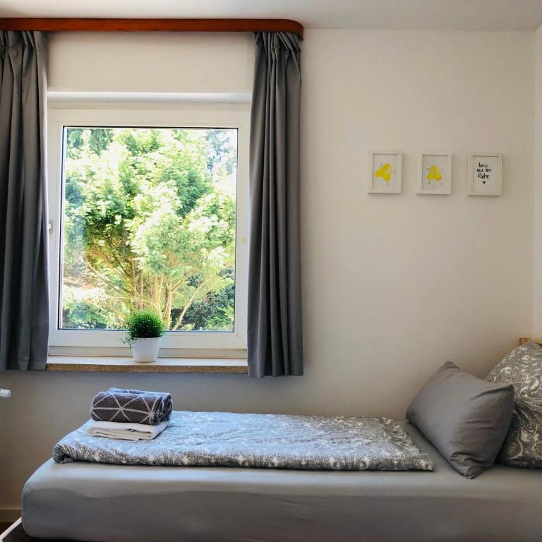 urbanAPARTMENTS Memmingen - mit Küche & Parkplatz - Apartment mit 2 Schlafzimmern und Gartenblick - 13