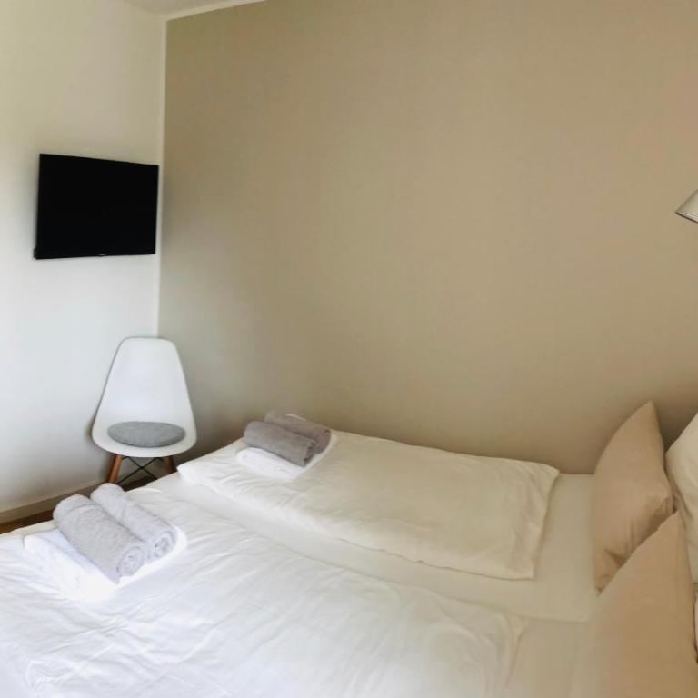 urbanAPARTMENTS Memmingen - mit Küche & Parkplatz - Apartment mit 2 Schlafzimmern und Gartenblick - 10
