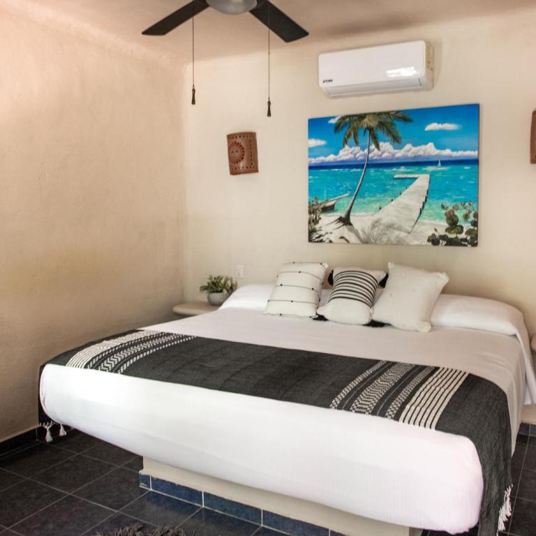 Hotel Macondo Holbox - Habitación con cama extragrande. - 1