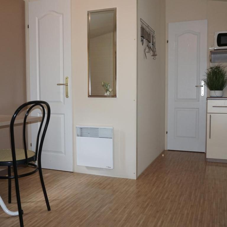 Chalets with kitchen outside at Camping Leï Suves - JoyCasa - Chalet Supérieur - 5