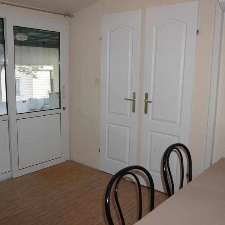 Chalets with kitchen outside at Camping Leï Suves - JoyCasa - Chalet Supérieur - 7