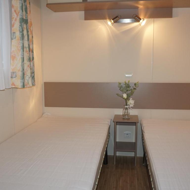 Chalets with kitchen outside at Camping Leï Suves - JoyCasa - Chalet Supérieur - 2