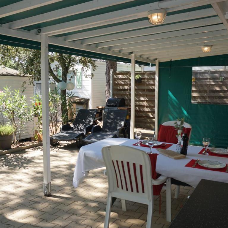 Chalets with kitchen outside at Camping Leï Suves - JoyCasa - Mobile Home - 3