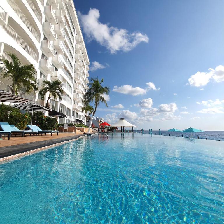 Coral Princess Hotel & Dive Resort - Deluxe Zimmer mit Kingsize-Bett am Meer - 4