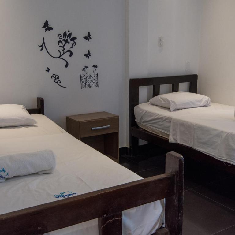 Casa Villamor - Habitación Doble Estándar con vistas al jardín - 2 camas - 10