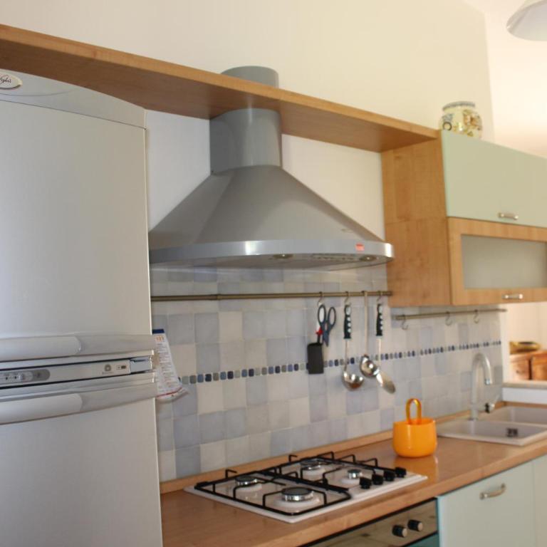 Casa Vacanze Libeccio - Villetta con giardino e piscina condominiale - Casa Vacanze - 11