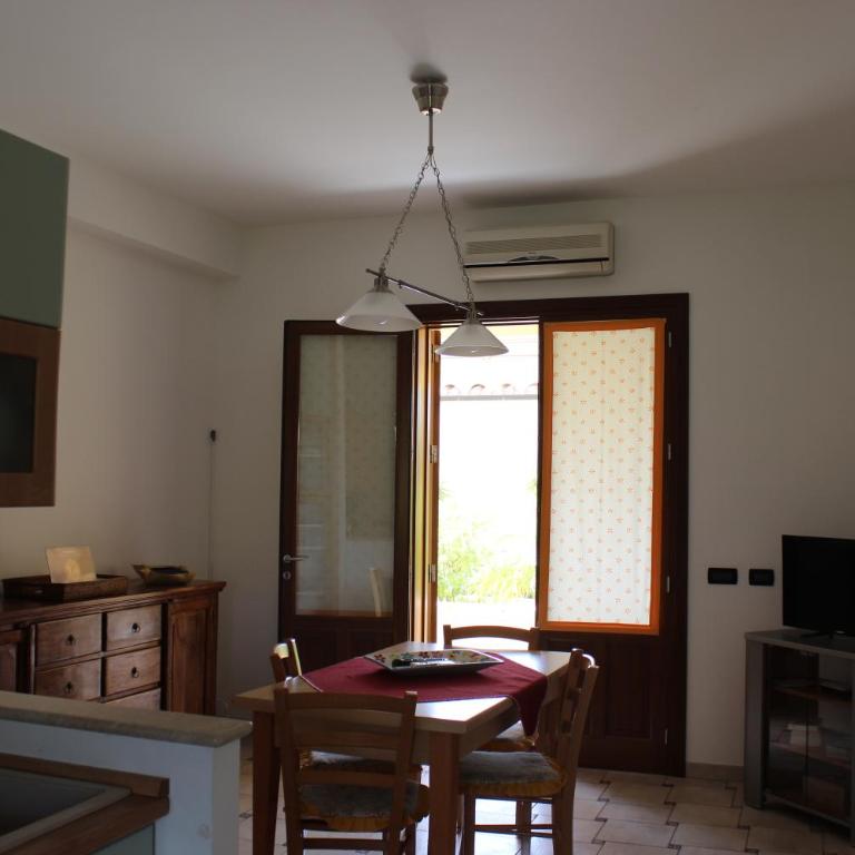 Casa Vacanze Libeccio - Villetta con giardino e piscina condominiale - Casa Vacanze - 9