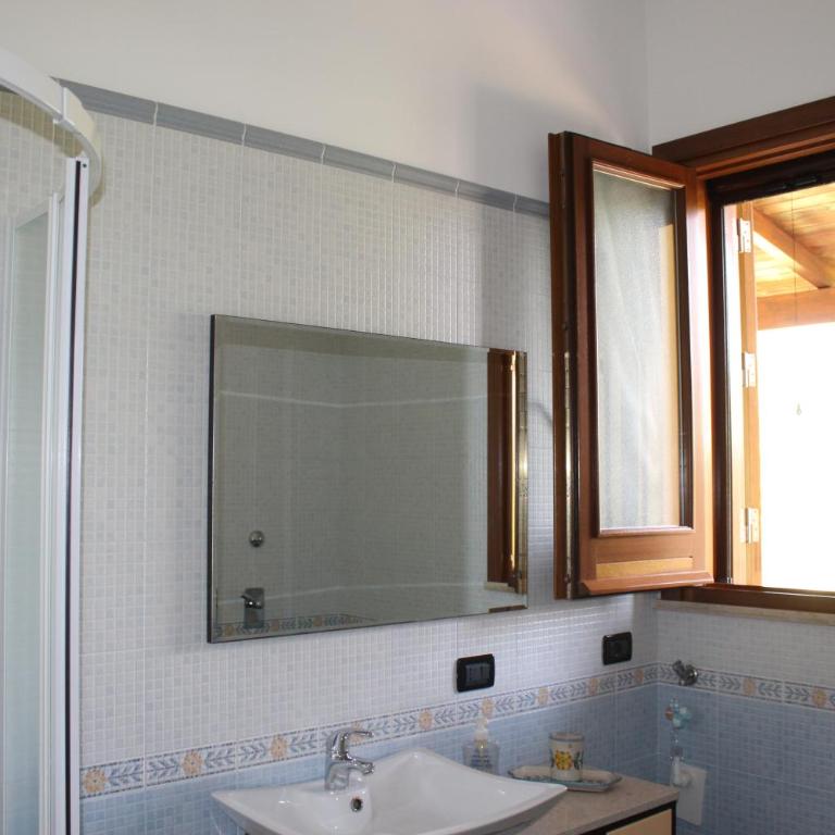 Casa Vacanze Libeccio - Villetta con giardino e piscina condominiale - Casa Vacanze - 14