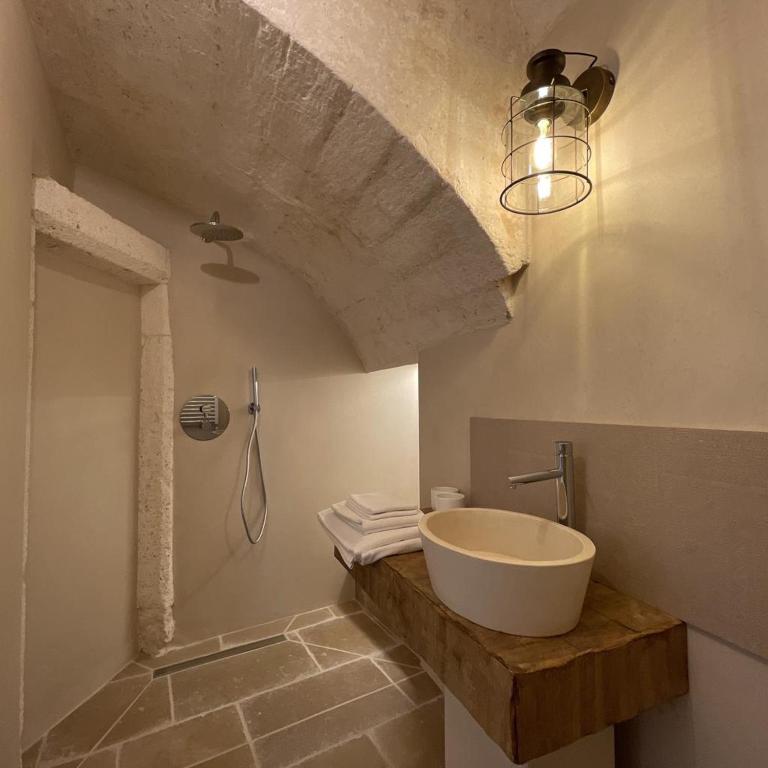 Caterina's Suites & Apartament - Camera King Deluxe - 4