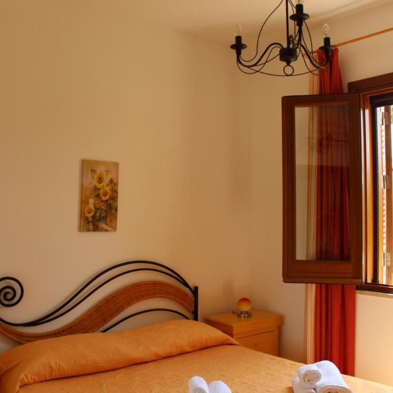 Casa Vacanze Libeccio - Villetta con giardino e piscina condominiale - Casa Vacanze - 4
