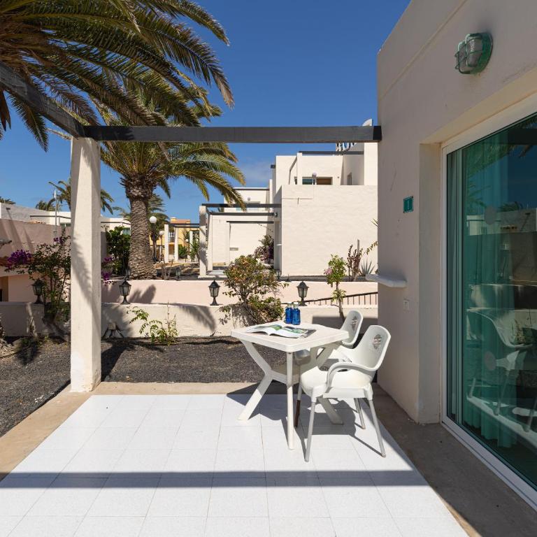 HomeForGuest Apartamento 15 con terraza y piscina en Corralejo - Apartamento - 22