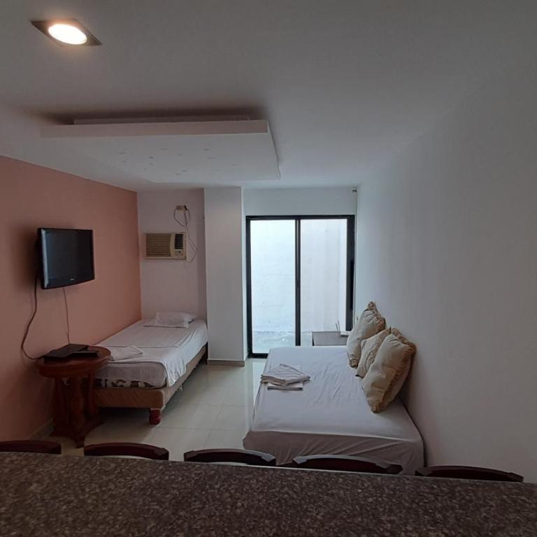 Suites y habitaciones en Edificación Amaralto - One-Bedroom Apartment - 13